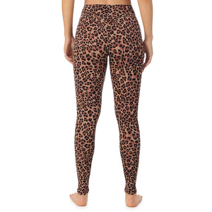 A lady wearing a taupe leopard high waist legging.