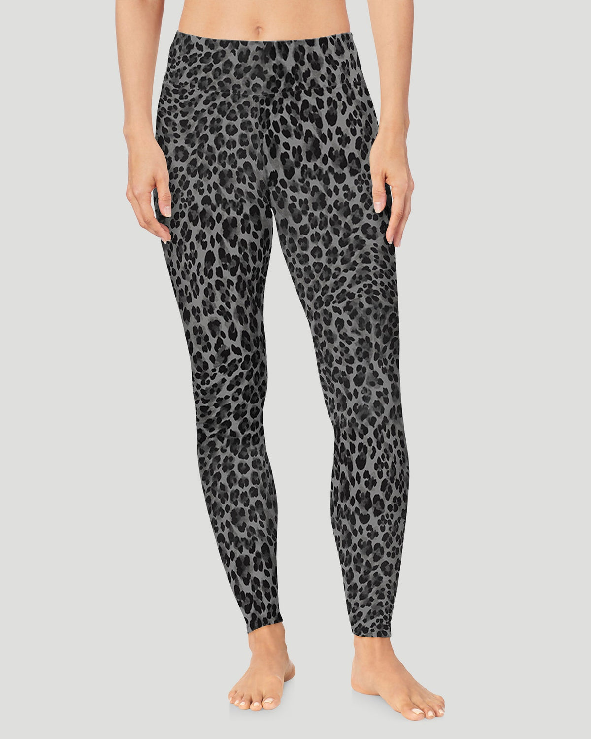 A lady wearing Softwear With Stretch High Waist Legging in charcoal leopard posing in a clean front view standing position
