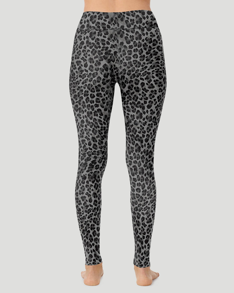 A lady wearing Softwear With Stretch High Waist Legging in charcoal leopard in a back view pose