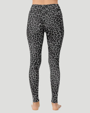 A lady wearing Softwear With Stretch High Waist Legging in charcoal leopard in a back view pose