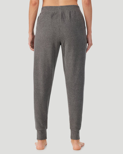 A lady wearing Charcoal Heather Fleecewear With Stretch Jogger in a back view pose