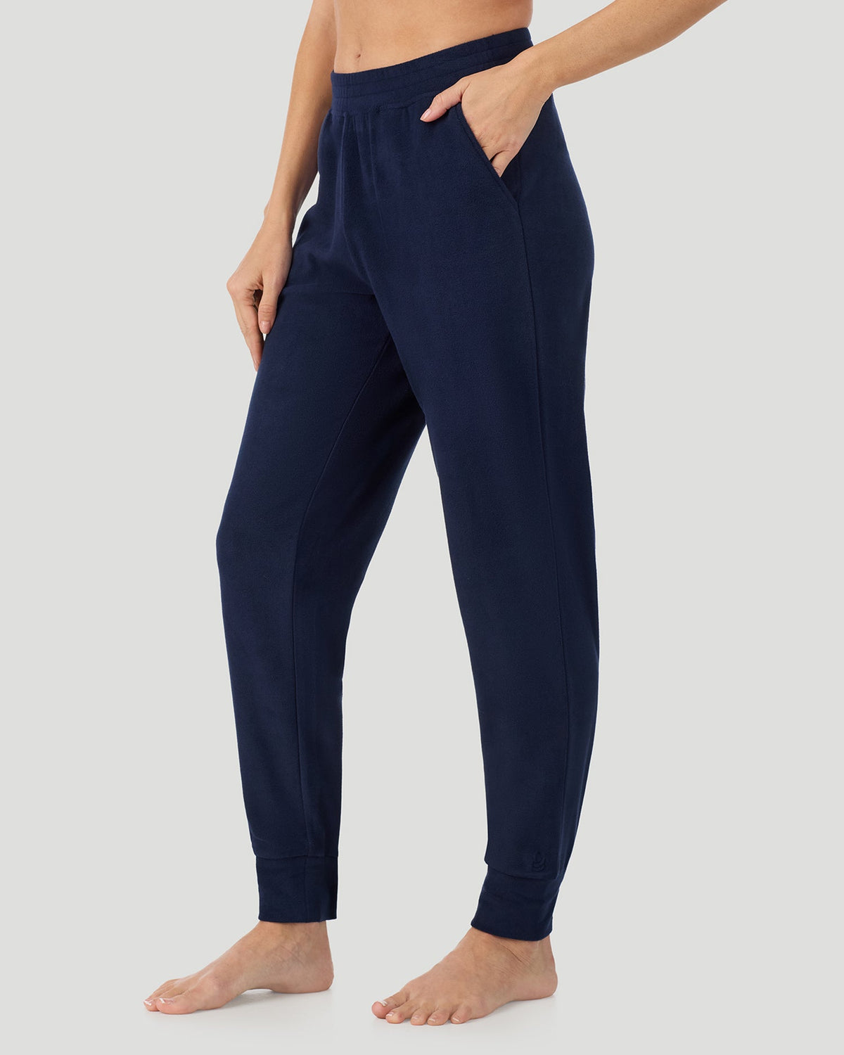 A lady wearing Navy Blazer Fleecewear With Stretch Jogger in a front view side angle pose
