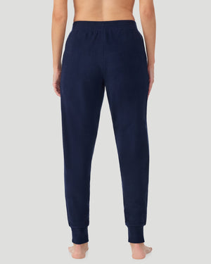A lady wearing Navy Blazer Fleecewear With Stretch Jogger in a back view pose