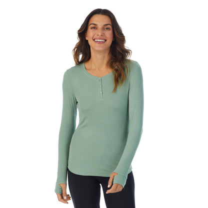 Soft Olive; Model is wearing size S.  She is 5’9”, Bust 34”, Waist 25.5”, Hips 36.5”.@A lady wearing soft olive ribbed long sleeve henley.