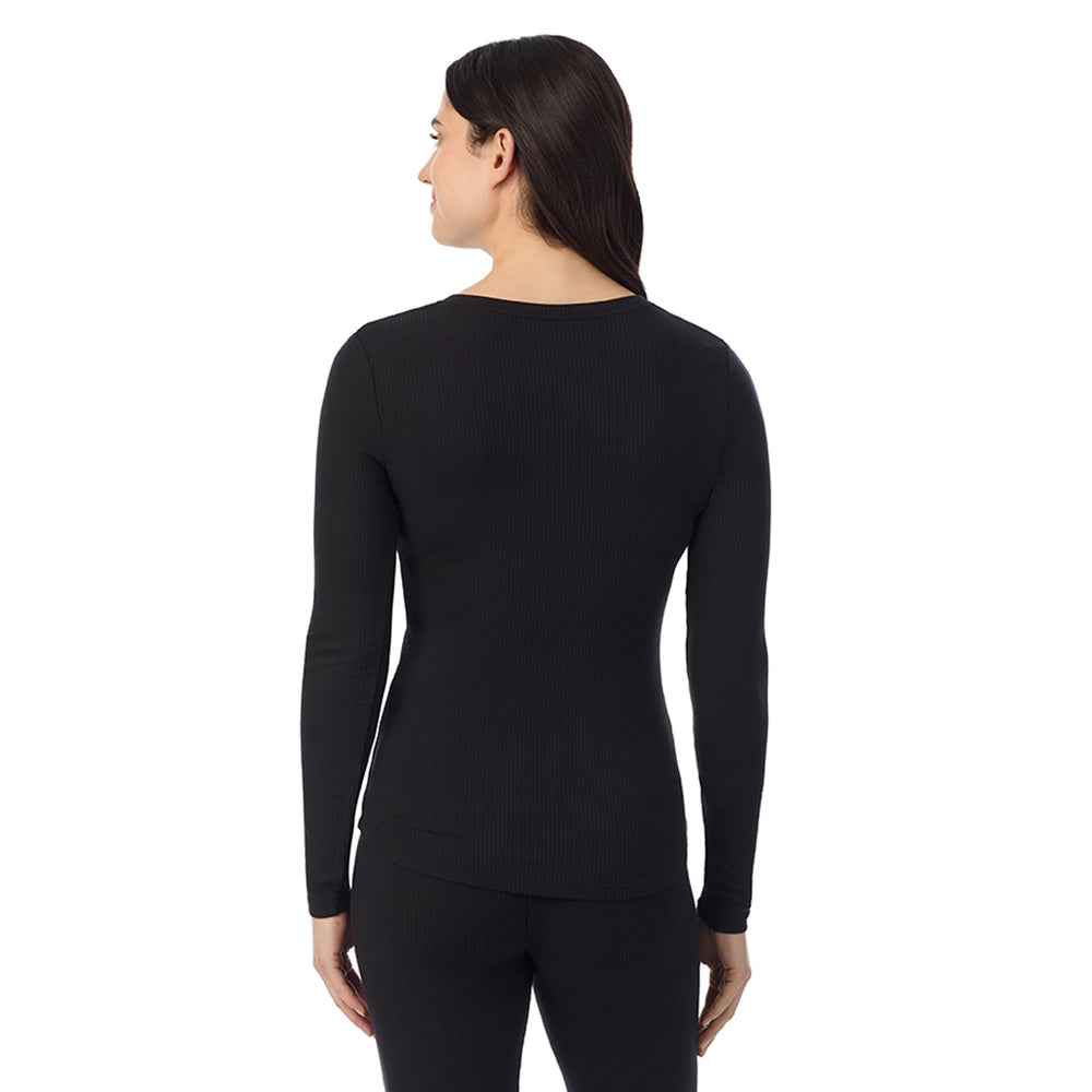 A lady is wearing a Black Stretch Rib Long Sleeve Henley