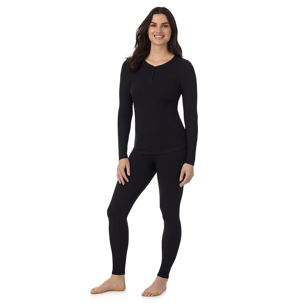 A lady is wearing a Black Stretch Rib Long Sleeve Henley