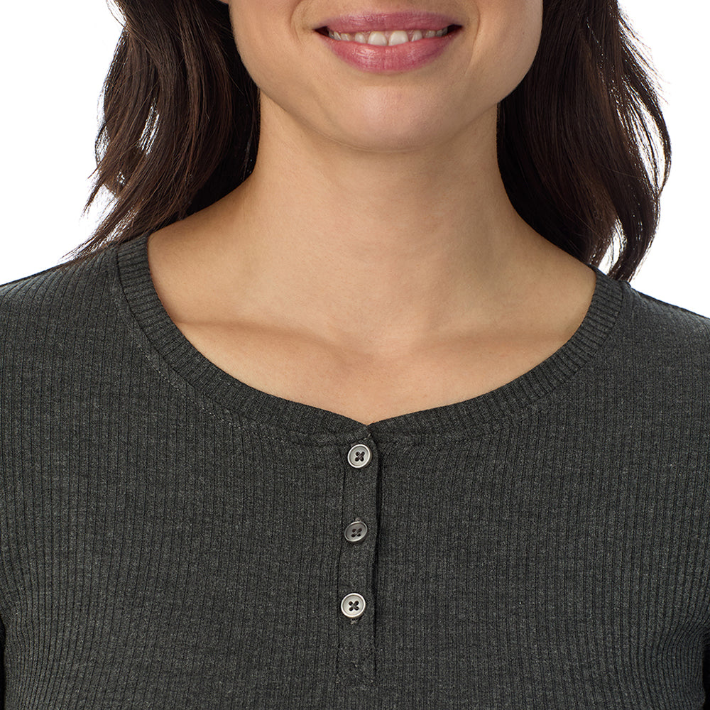 A lady is wearing a Charcoal Heather Stretch Rib Long Sleeve Henley