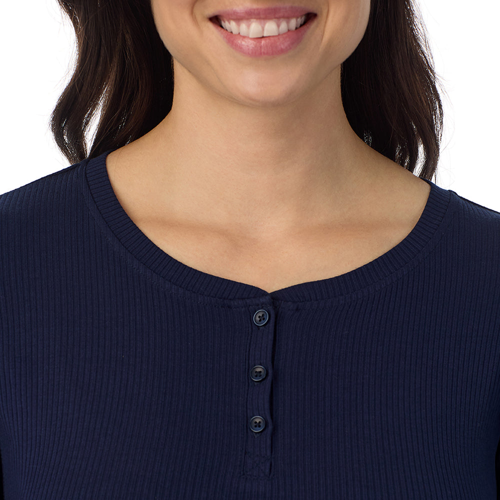 A lady is wearing a Navy Blazer Stretch Rib Long Sleeve Henley