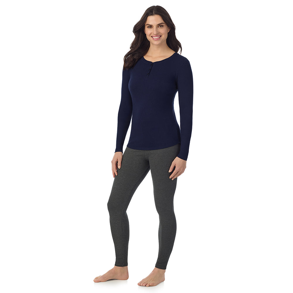 A lady is wearing a Navy Blazer Stretch Rib Long Sleeve Henley