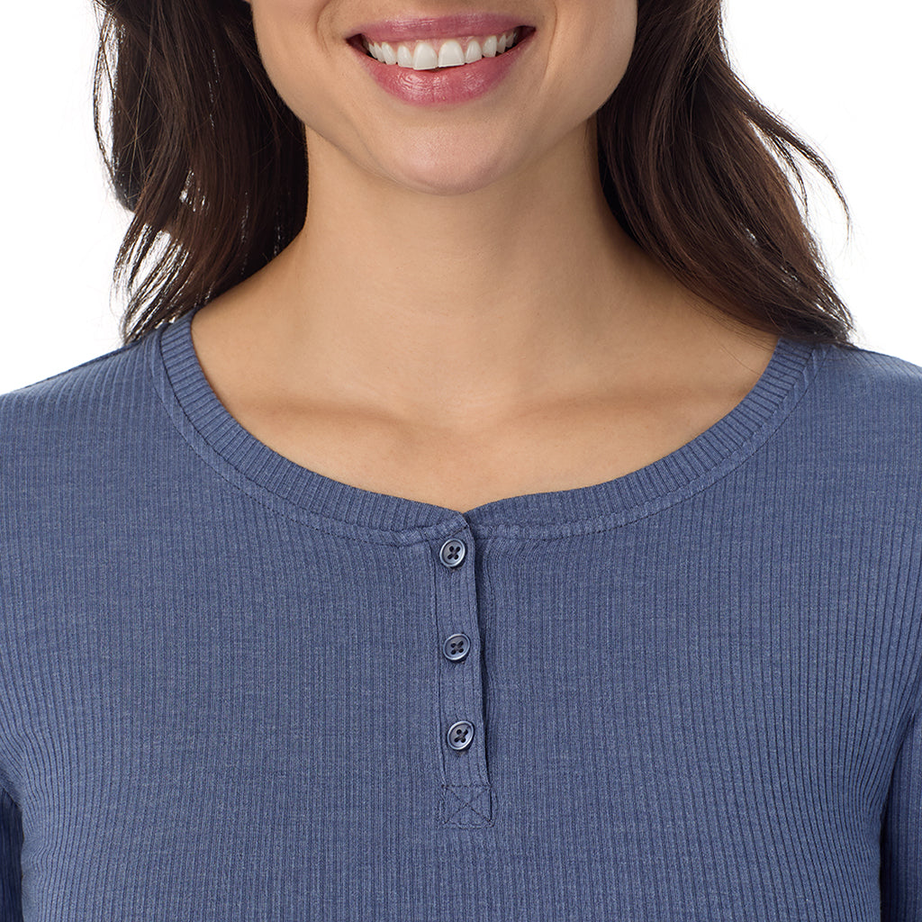  A lady is wearing a Smoke Blue Heather Stretch Rib Long Sleeve Henley