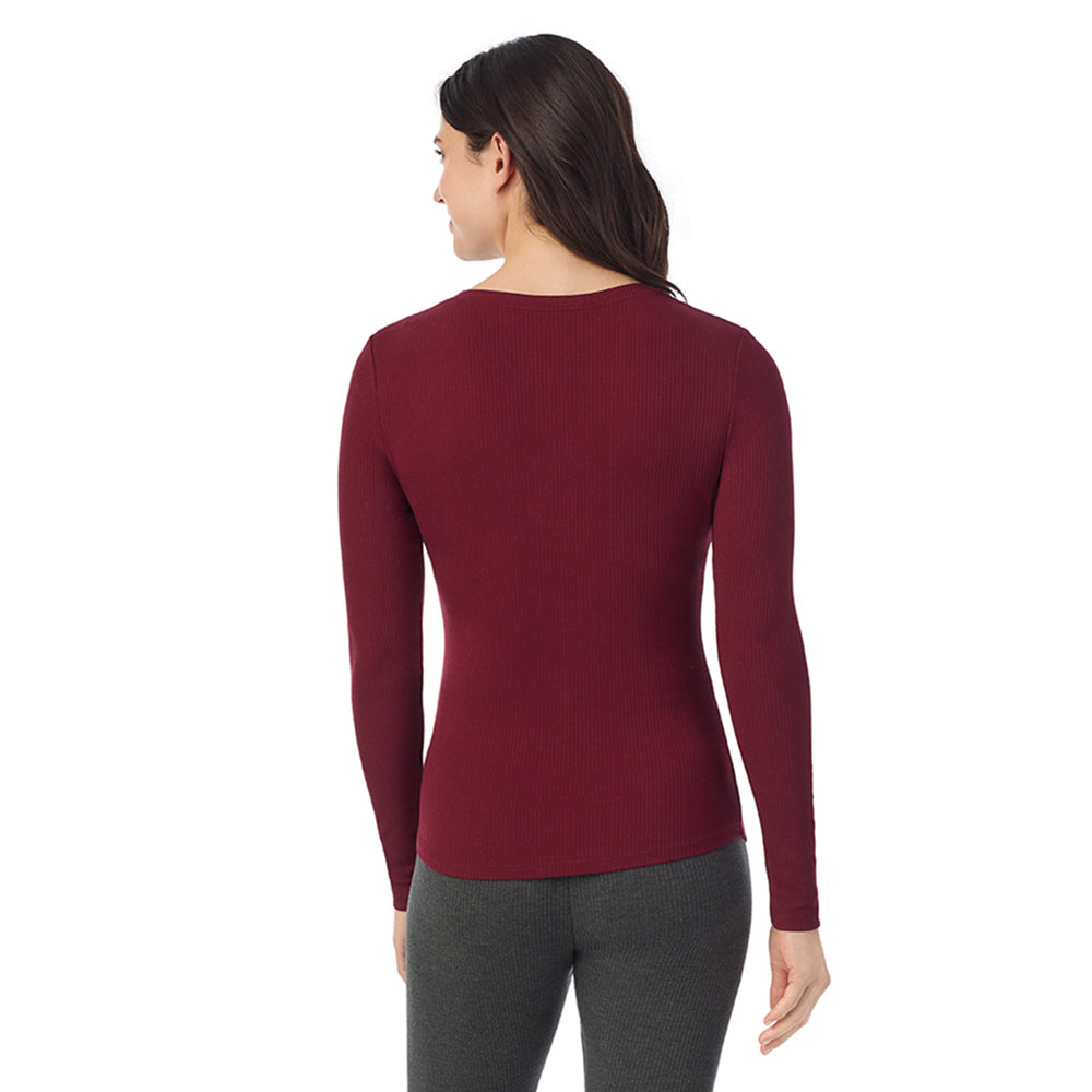 A lady is wearing a Cabernet Stretch Rib Long Sleeve Henley
