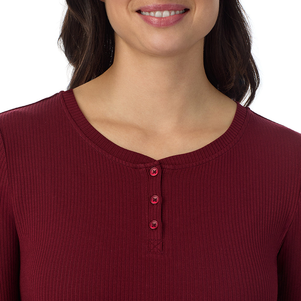 A lady is wearing a Cabernet Stretch Rib Long Sleeve Henley