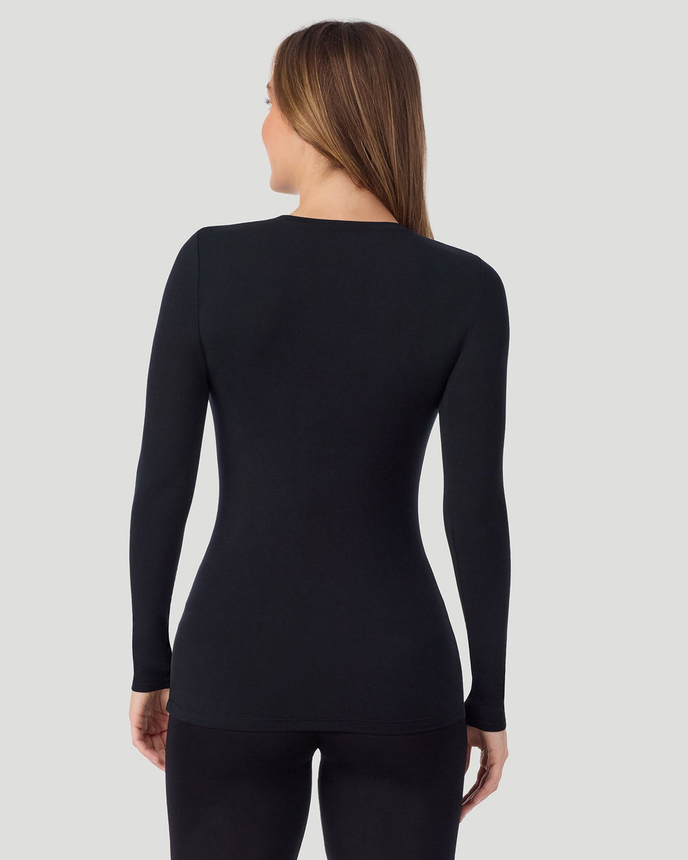 A lady wearing Softwear With Stretch Crew Neck Tank With Lace in ivory shown in a back view pose