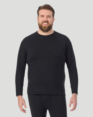 A man wearing black long sleeve crew t-shirt facing front