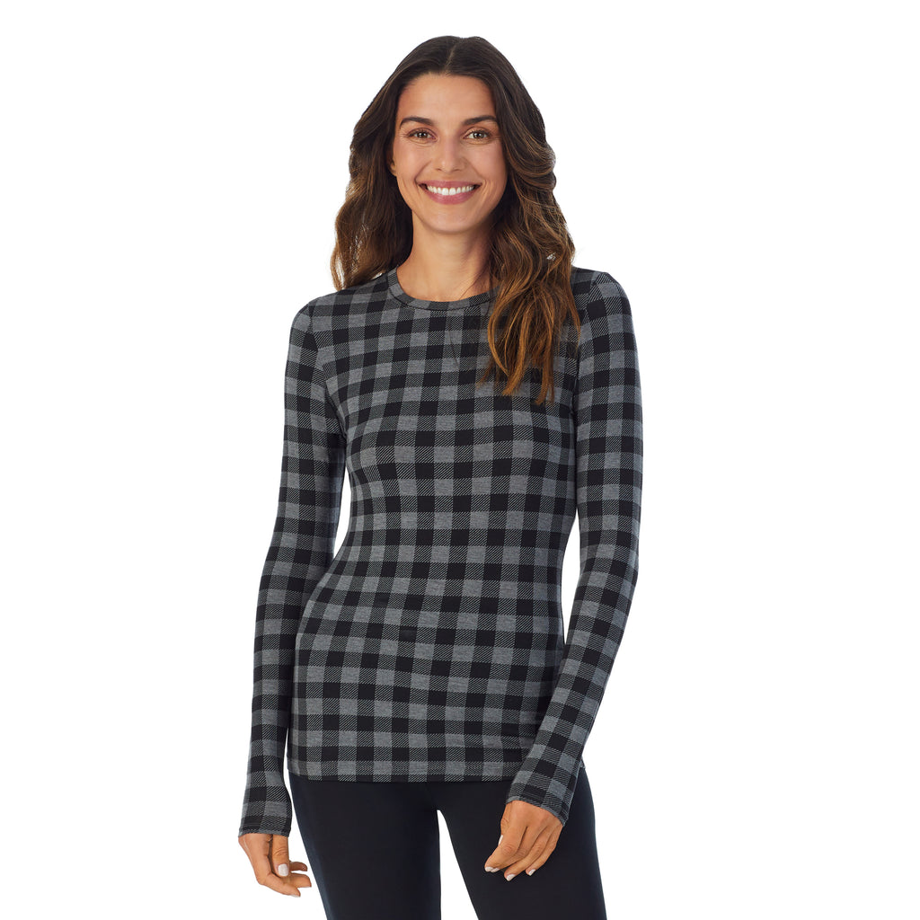 A lady wearing tonal buffalo long sleeve crew petite softwear with stretch top.