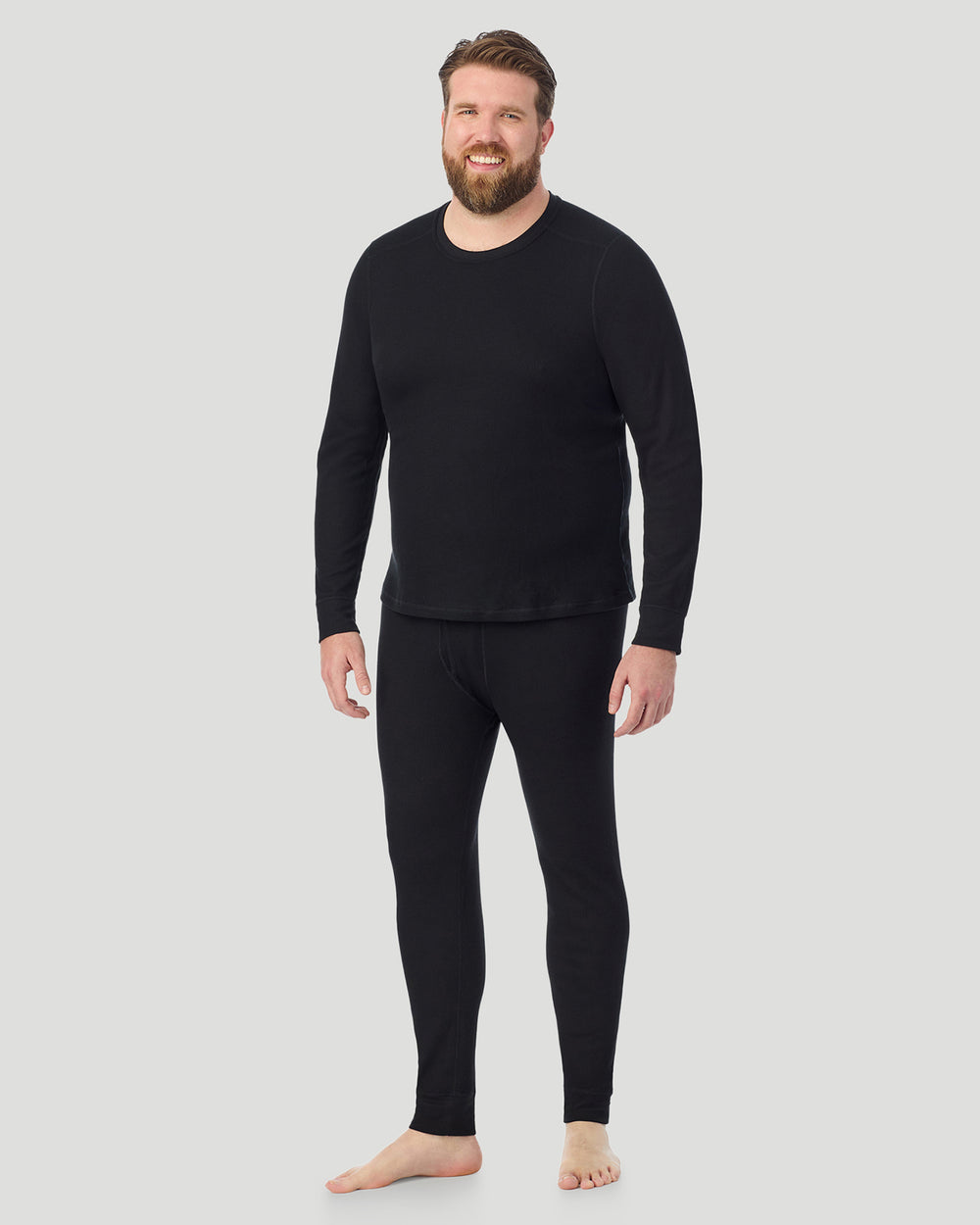 A man wearing Black Waffle Thermal Long Sleeve Crew Big & Tall in a front view standing pose