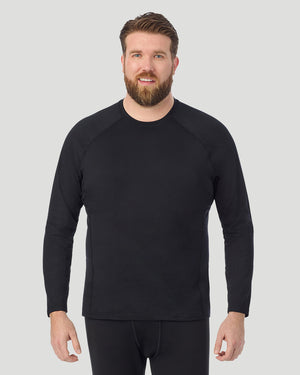  A man wearing Black ArctiCore Long Sleeve Crew Big & Tall in a front view pose