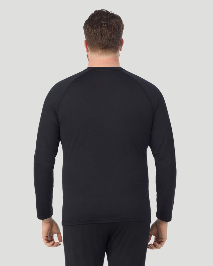 A man wearing Black ArctiCore Long Sleeve Crew Big & Tall in a back view pose
