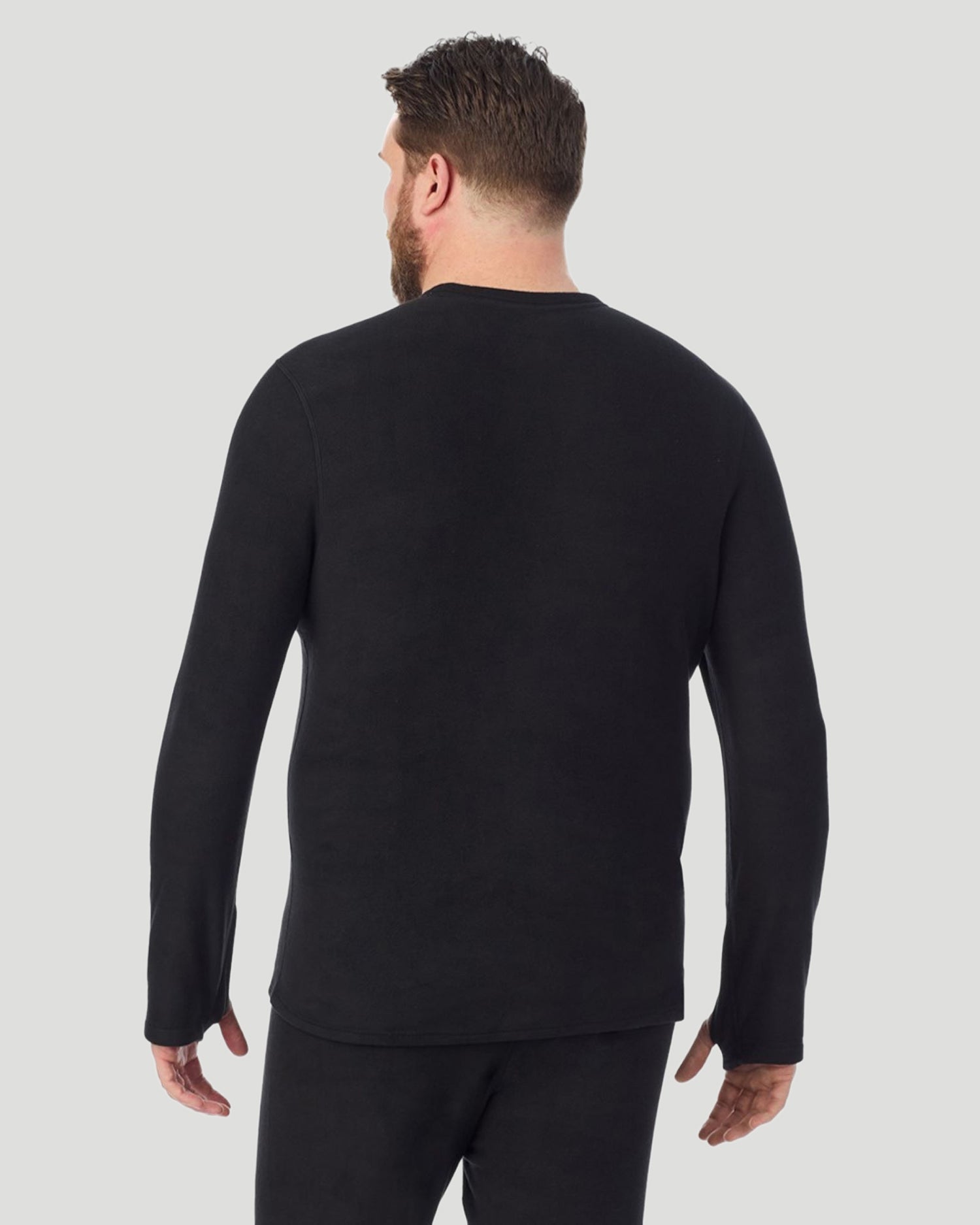 Black; Model is wearing a size XXL. He is 6’6”, Waist is 32”, Inseam 35”. @ A man wearing Black Fleecewear Long Sleeve Crew Big & Tall in a front view pose