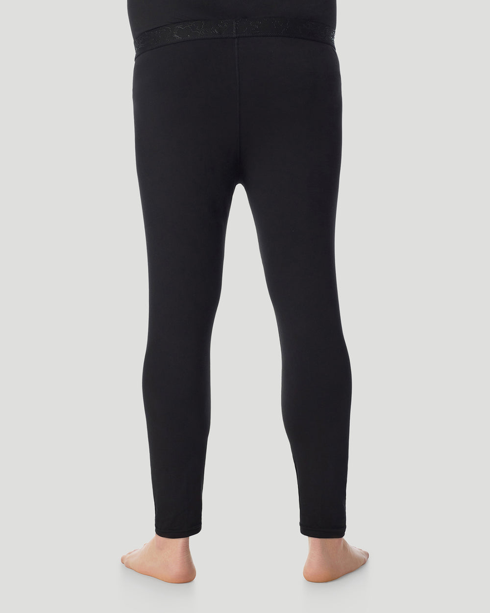 Lower body of a man wearing black pants back pose