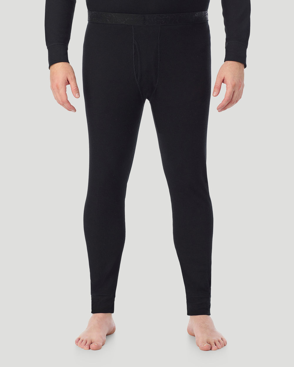 A man wearing Black Waffle Thermal Pant Big & Tall in a front view pose