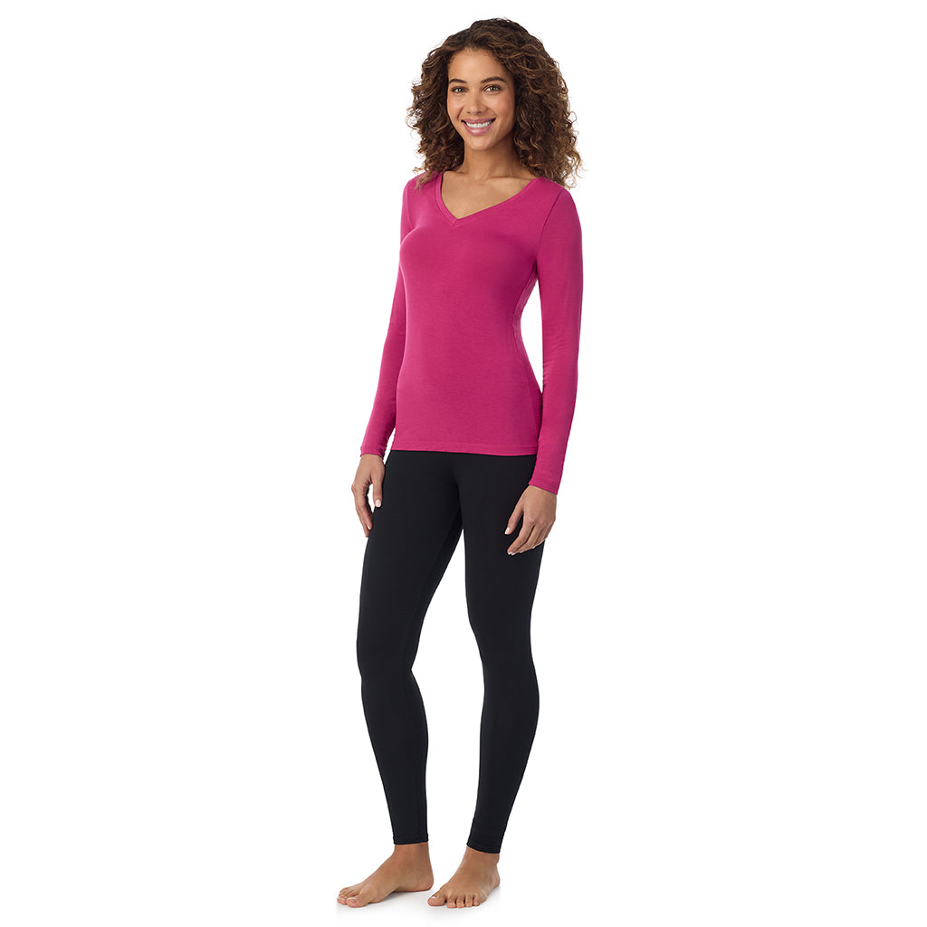 Deep Fuchsia; Model is wearing size S. She is 5’9”, Bust 34”, Waist 23”, Hips 35”.@ A lady wearing deep fuchsia long sleeve v-neck petite softwer with stretch top.