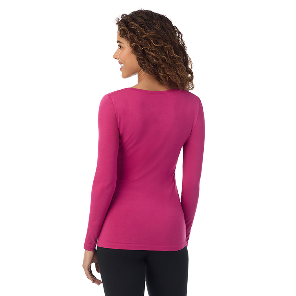 Deep Fuchsia; Model is wearing size S. She is 5’9”, Bust 34”, Waist 23”, Hips 35”.@ A lady wearing deep fuchsia long sleeve v-neck petite softwer with stretch top.