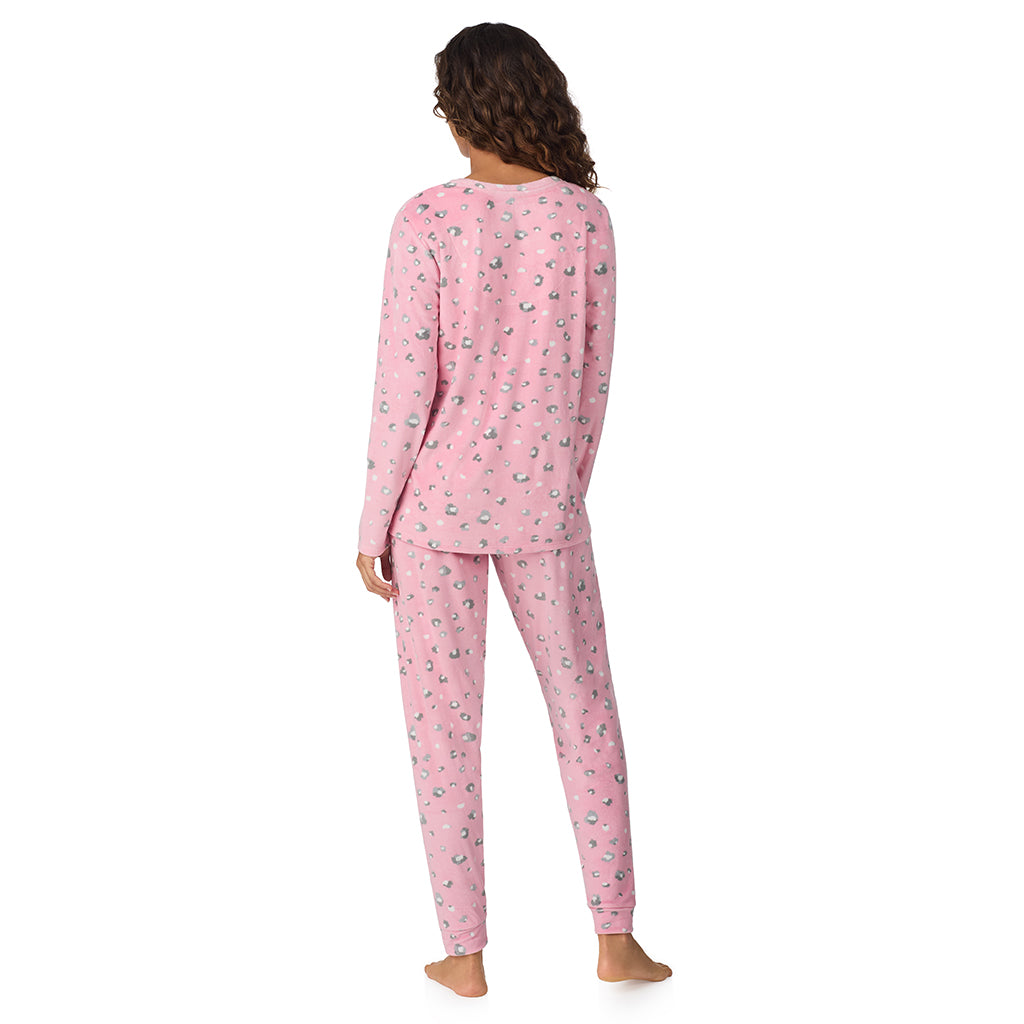 A lady wearing Pink Animal Silky Velour Long Sleeve Pullover with Jogger 2-Pc Pajama Set