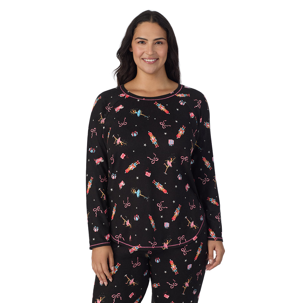 A lady wearing Nutcracker Brushed Sweater Knit Long Sleeve Top with Jogger 2-Pc Pajama Set PLUS