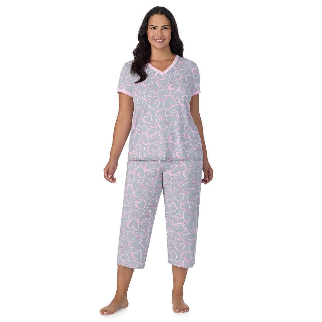 A lady wearing Grey Scribble Hearts Cotton-Blend Short Sleeve Top with Cropped Pant 2-Pc Pajama Set PLUS 