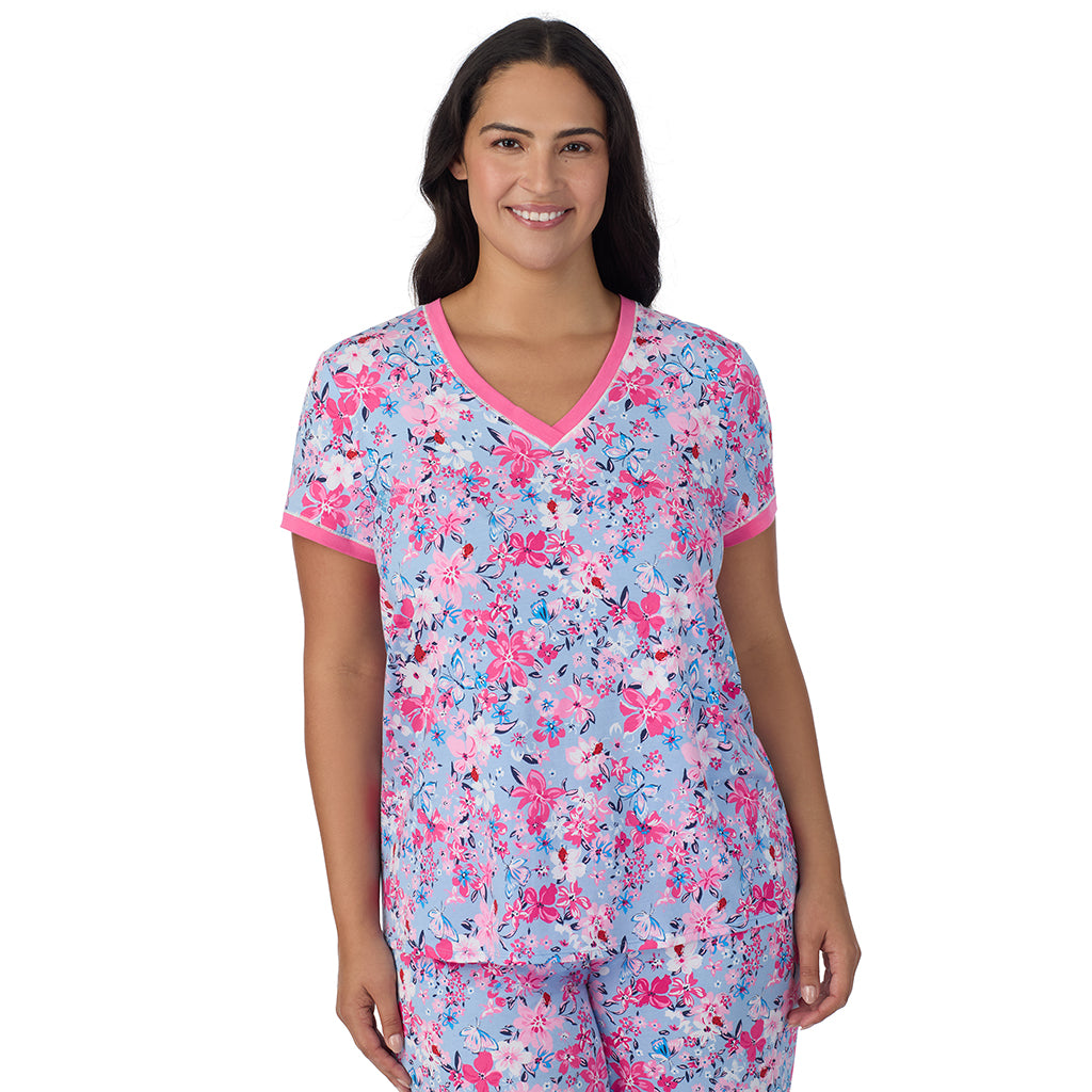 Blue Multi Floral;Model is wearing size 1X. She is 5'10", Bust 40", Waist 33", Hips 47".@A lady wearing Blue Multi Floral Cotton-Blend Short Sleeve Top with Cropped Pant 2-Pc Pajama Set PLUS !57% Cotton, 38% Modal, 5% Spandex!