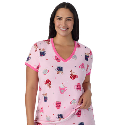 Pink Latte;Model is wearing size 1X. She is 5'10", Bust 40", Waist 33", Hips 47".@A lady wearing Pink Latte Cotton-Blend Short Sleeve Top with Cropped Pant 2-Pc Pajama Set PLUS !57% Cotton, 38% Modal, 5% Spandex!