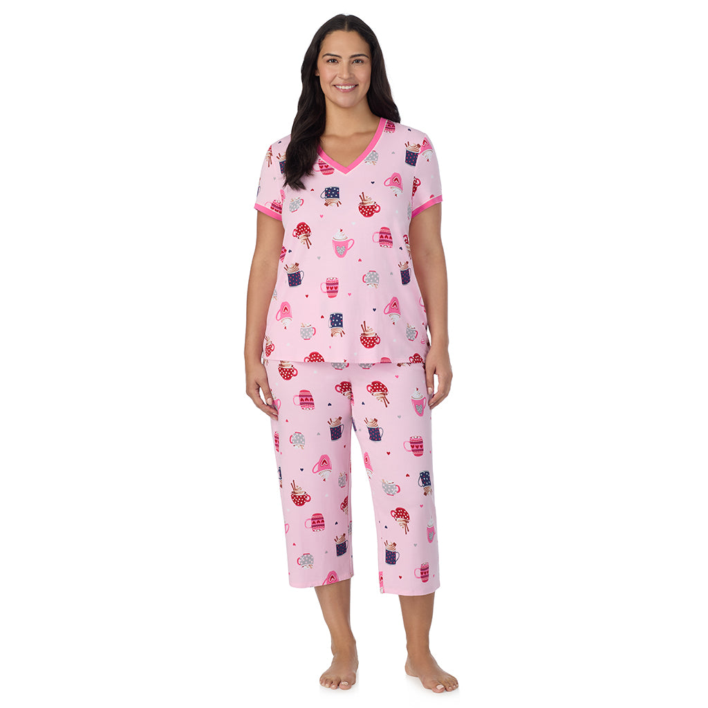 Pink Latte;Model is wearing size 1X. She is 5'10", Bust 40", Waist 33", Hips 47".@A lady wearing Pink Latte Cotton-Blend Short Sleeve Top with Cropped Pant 2-Pc Pajama Set PLUS !57% Cotton, 38% Modal, 5% Spandex!