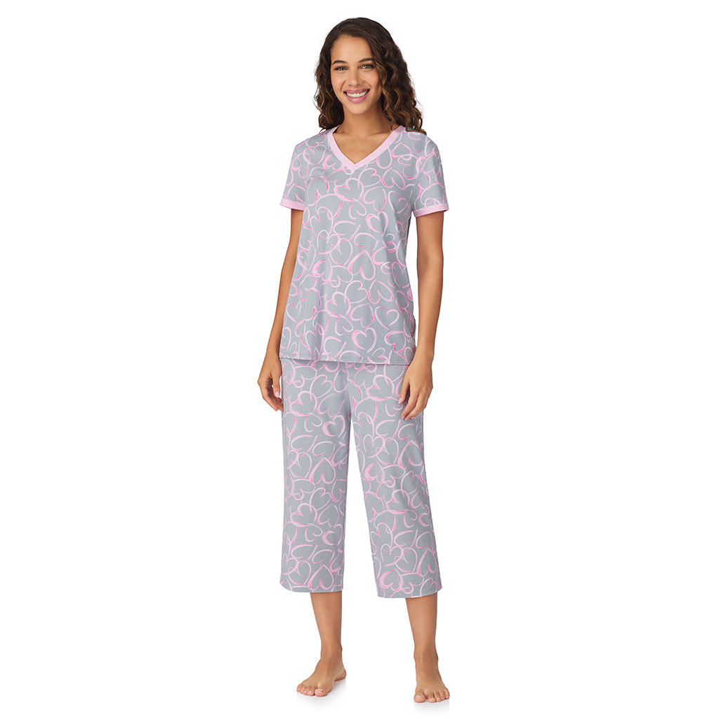 A lady wearing Grey Scribble Hearts Cotton-Blend Short Sleeve Top with Cropped Pant 2-Pc Pajama Set 