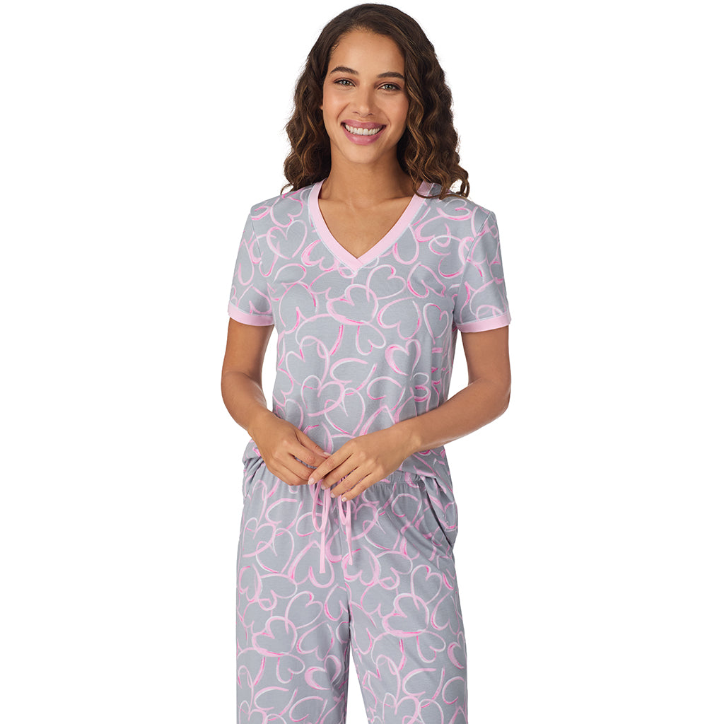 Grey Scribble Hearts;Model is wearing size S. She is 5’9”, Bust 34”, Waist 23”, Hips 35”.@A lady wearing Grey Scribble Hearts Cotton-Blend Short Sleeve Top with Cropped Pant 2-Pc Pajama Set !57% Cotton, 38% Modal, 5% Spandex!