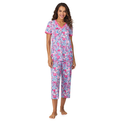 Blue Multi Floral;Model is wearing size S. She is 5’9”, Bust 34”, Waist 23”, Hips 35”.@A lady wearing Blue Multi Floral Cotton-Blend Short Sleeve Top with Cropped Pant 2-Pc Pajama Set !57% Cotton, 38% Modal, 5% Spandex!