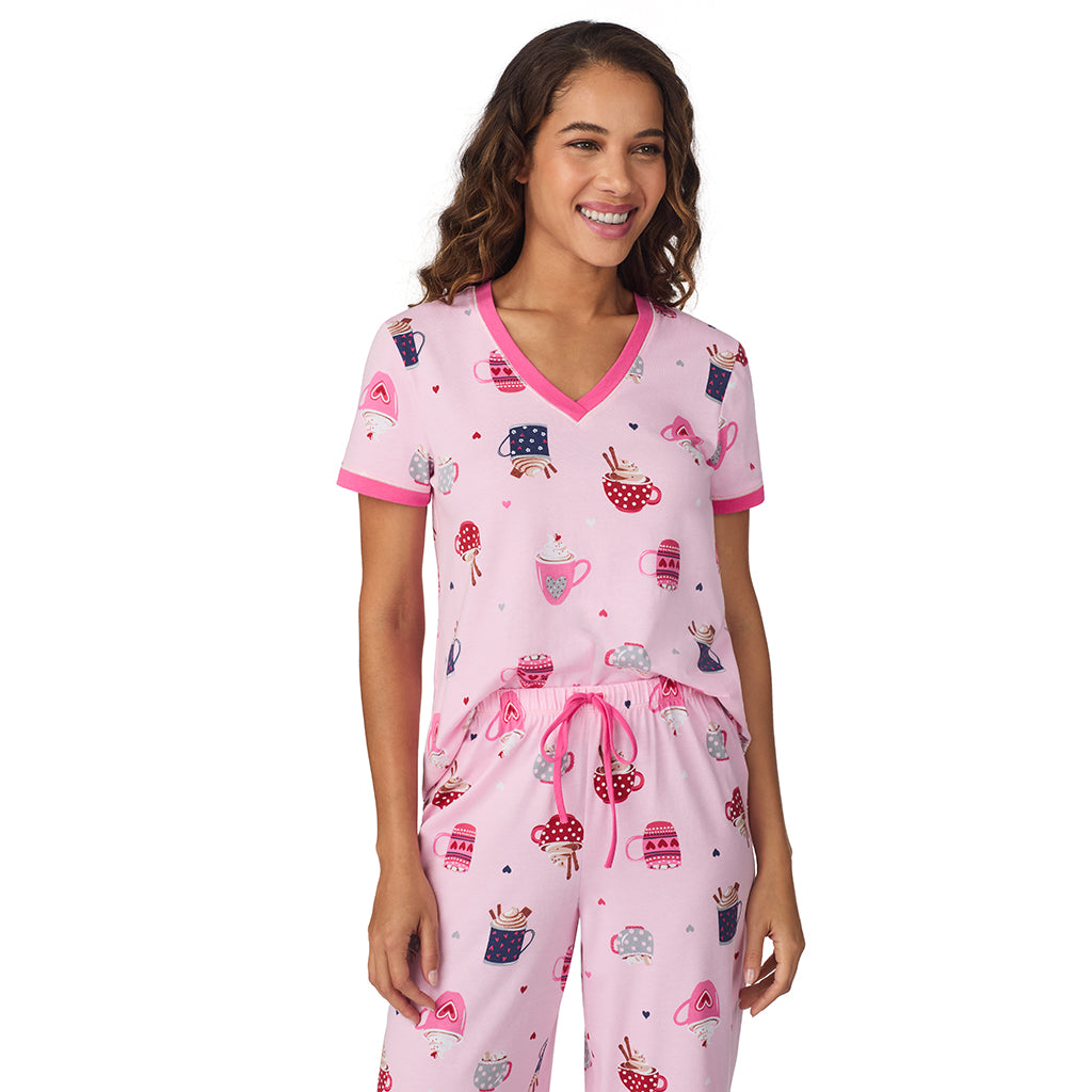 Pink Latte;Model is wearing size S. She is 5’9”, Bust 34”, Waist 23”, Hips 35”.@A lady wearing Pink Latte Cotton-Blend Short Sleeve Top with Cropped Pant 2-Pc Pajama Set !57% Cotton, 38% Modal, 5% Spandex!