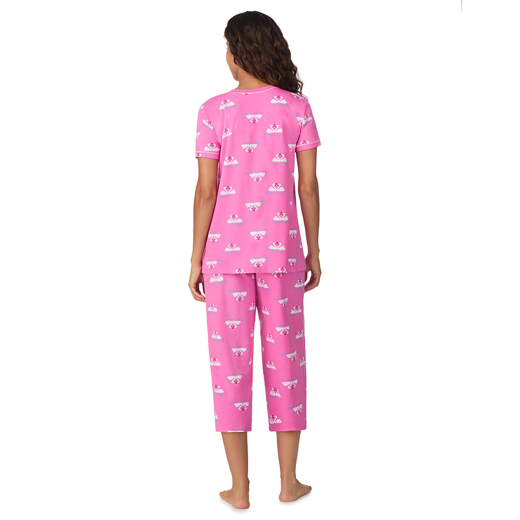 Pink Swans;Model is wearing size S. She is 5’9”, Bust 34”, Waist 23”, Hips 35”.@A lady wearing Pink Swans Cotton-Blend Short Sleeve Top with Cropped Pant 2-Pc Pajama Set !57% Cotton, 38% Modal, 5% Spandex!