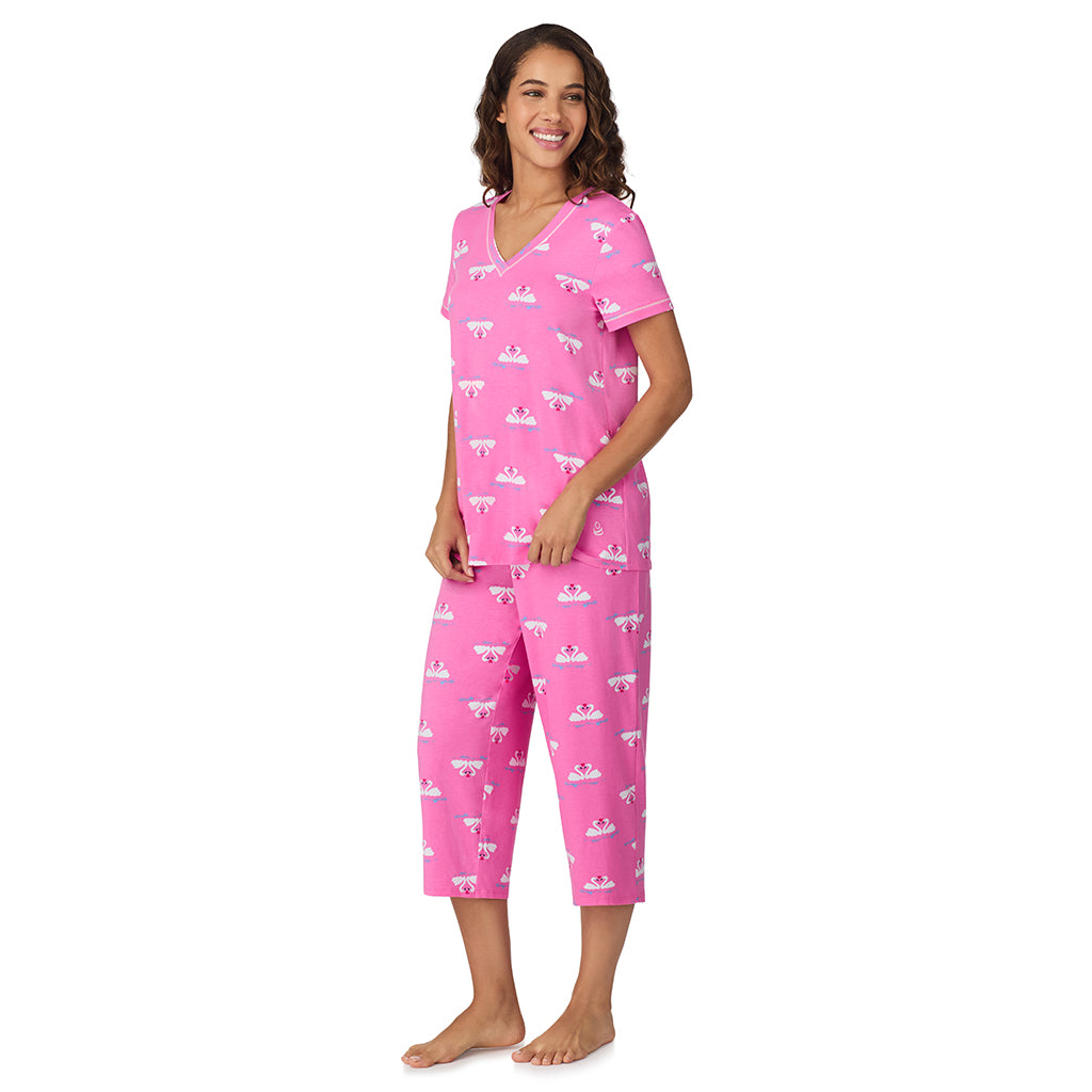 A lady wearing Pink Swans Cotton-Blend Short Sleeve Top with Cropped Pant 2-Pc Pajama Set 