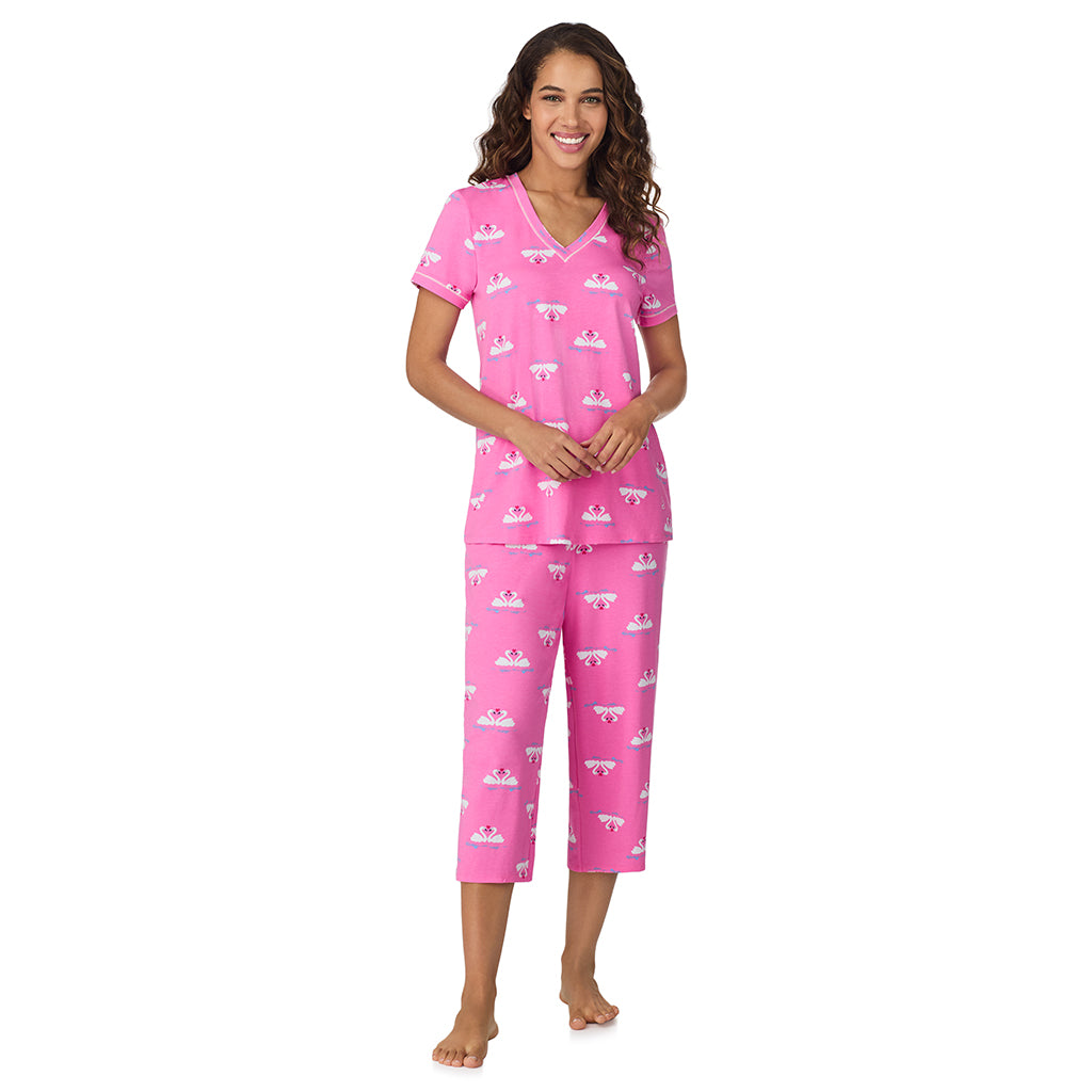 A lady wearing Pink Swans Cotton-Blend Short Sleeve Top with Cropped Pant 2-Pc Pajama Set 