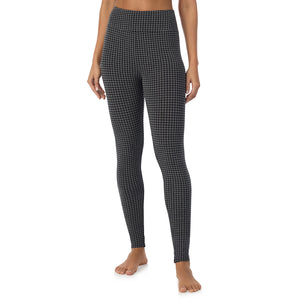 A lady wearing a charcoal heather houndsooth High Waist Leggings