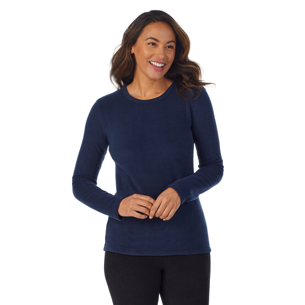 A Lady is wearing a Navy Blazer Fleecewear With Stretch Long Sleeve Crew TALL !94% Recycled Polyester, 6% Spandex!