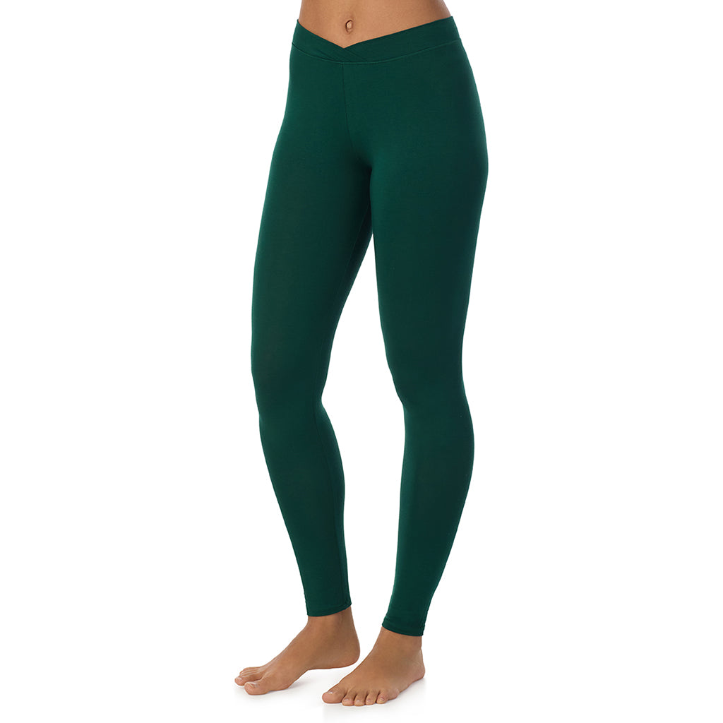 Evergreen; Model is wearing size S. She is 5’9”, Bust 34”, Waist 23”, Hips 35”. @A lady wearing a evergreen stretch legging tall.