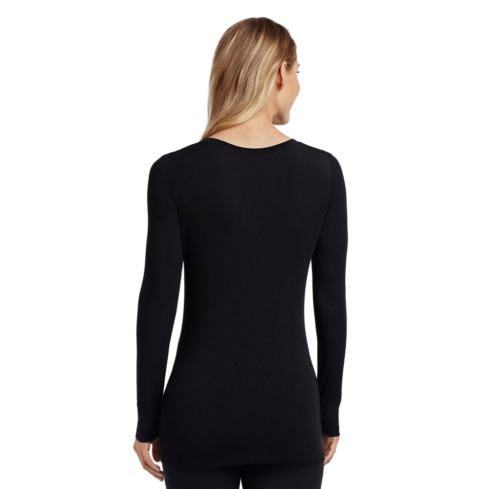 A lady wearing black long sleeve v-neck tall softwear with stretch top.