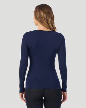 A lady wearing a black stretch legging tall.