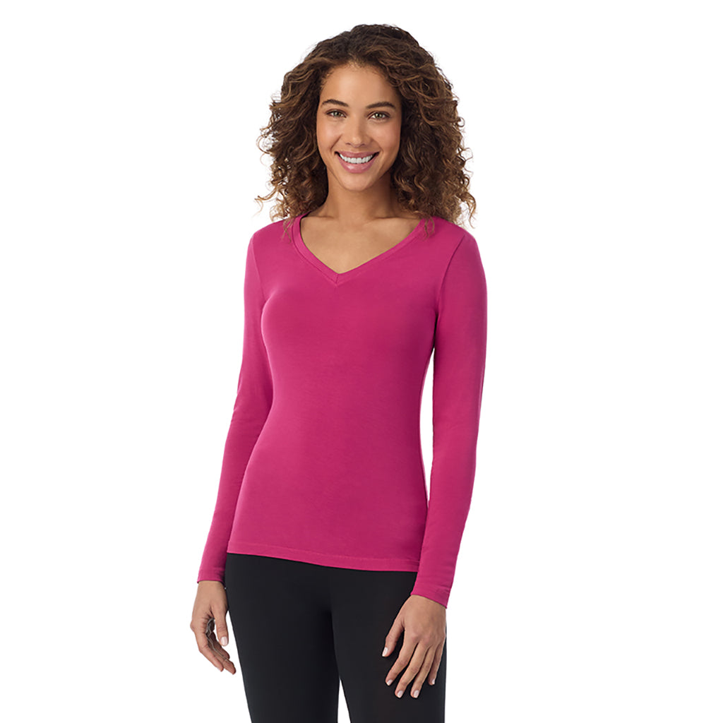 Deep Fuchsia; Model is wearing size S. She is 5’9”, Bust 34”, Waist 23”, Hips 35”. @A lady wearing deep fuchsia long sleeve v-neck tall softwear with stretch top.