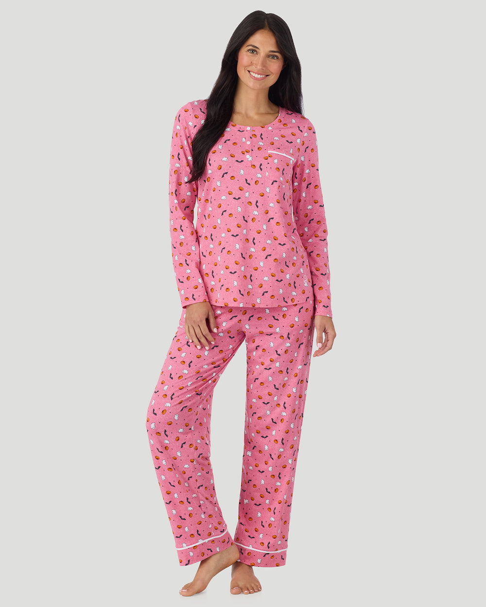 A lady wearing Cotton-Blend Long Sleeve Top and Long Pant Pajama Set in Pink Halloween looking front