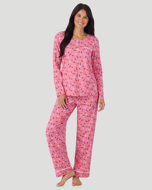 A lady wearing Cotton-Blend Long Sleeve Top and Long Pant Pajama Set in Pink Halloween looking front