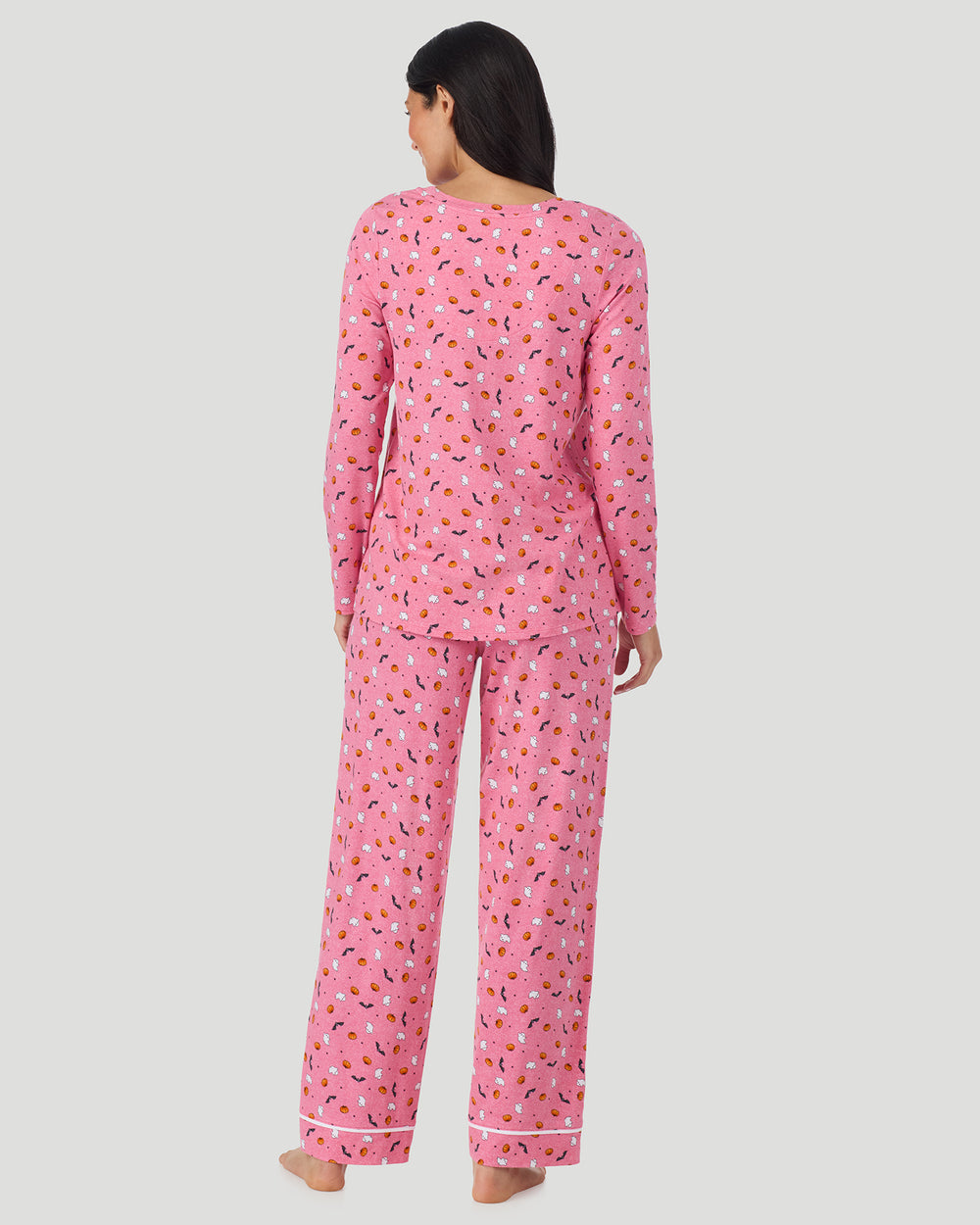 A lady wearing Cotton-Blend Long Sleeve Top and Long Pant Pajama Set in Pink Halloween back view