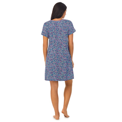 Multi Animal;Model is wearing size S. She is 5'8.5", Bust 32", Waist 25", Hips 36".@A lady wearing a short sleeve sleepshirt with multi animal print